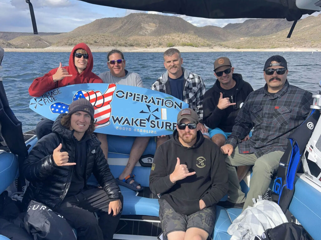 Operation Wakesurf with military, police and fire personnel and pro riders